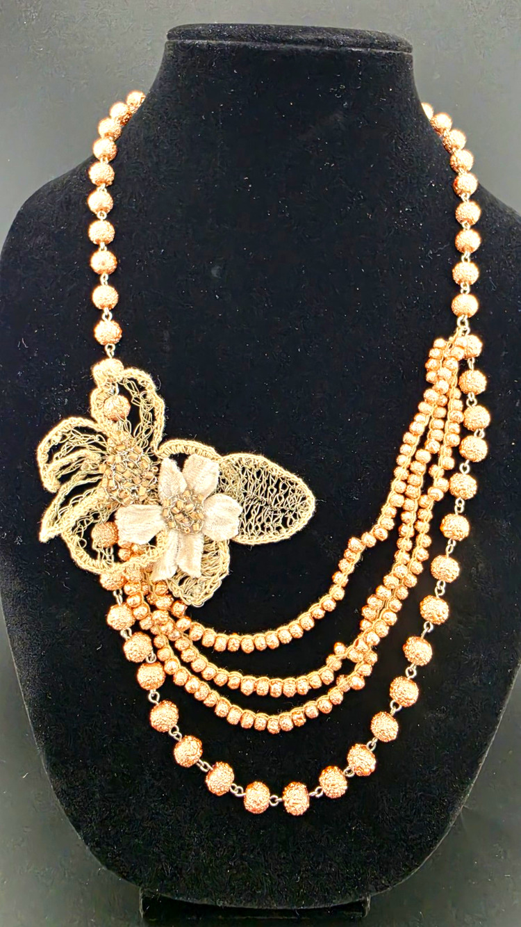 Authentic handcrafted by jewelry artist Lisa Toland.